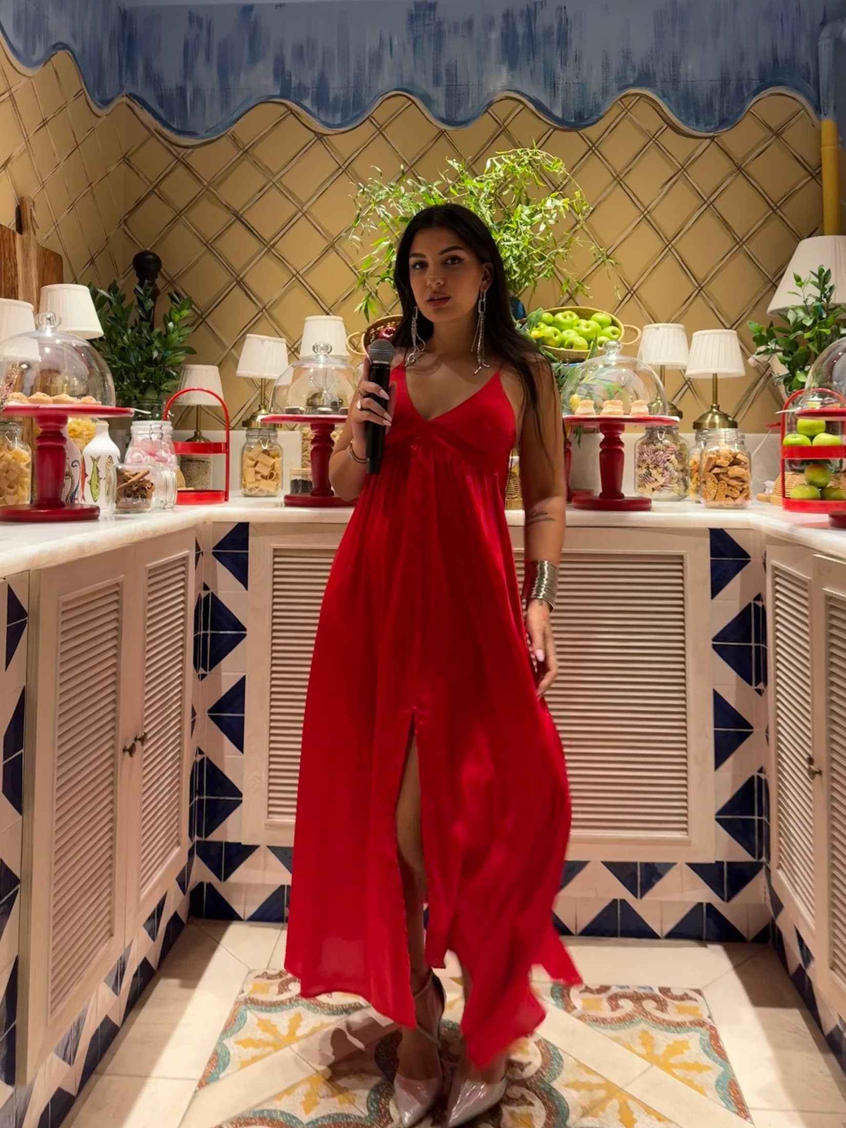 Carol Magagna in an evening gown at a luxury Dubai venue
